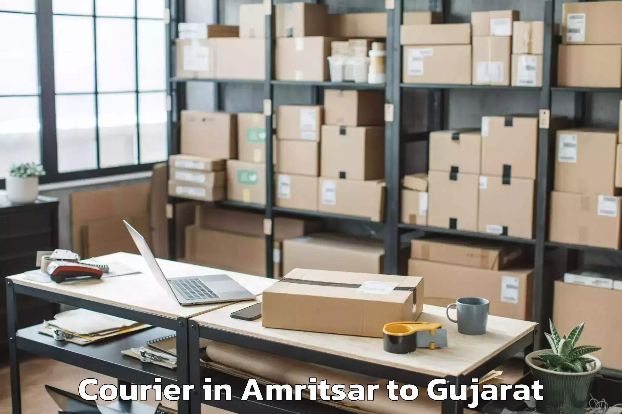 Leading Amritsar to Lodhika Courier Provider